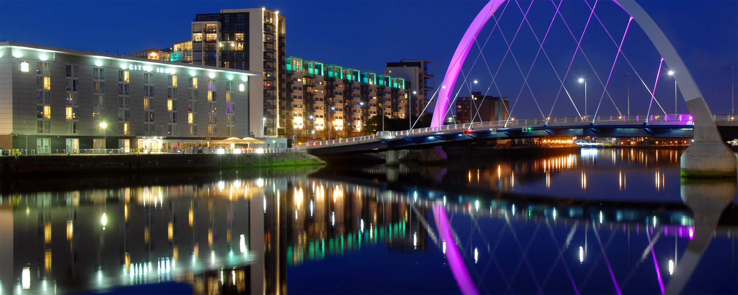 Glasgow Clyde at night panoramic scene